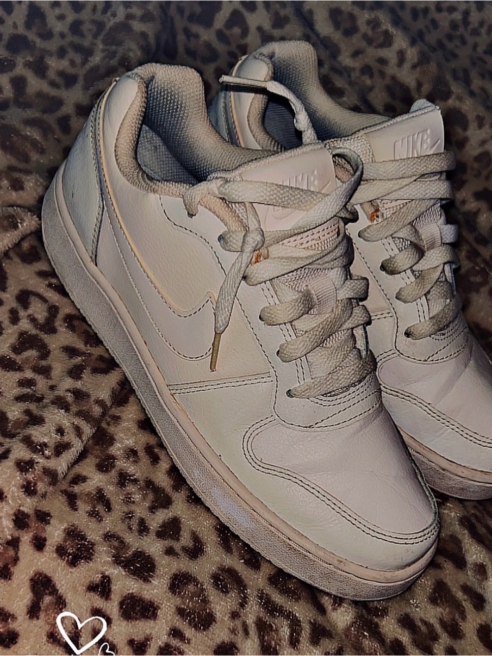 Nike Women’s White Low-Top Sneakers with Subtle Gold Accents